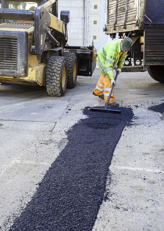 Local Blacktop Resurfacing pros at work