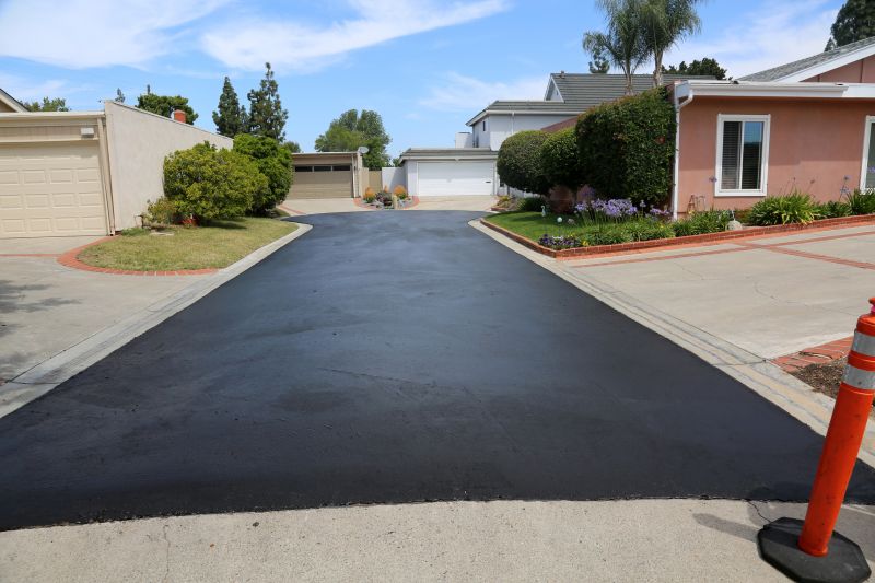 Finished Blacktop Driveway with Landscaping